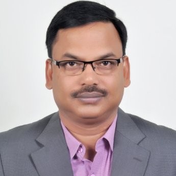 Portrait of Dr Tapan Panda, faculty at First Bridge Business School