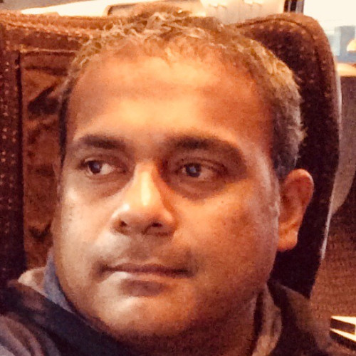 Portrait of Vijay Sarthi, faculty at First Bridge Business School