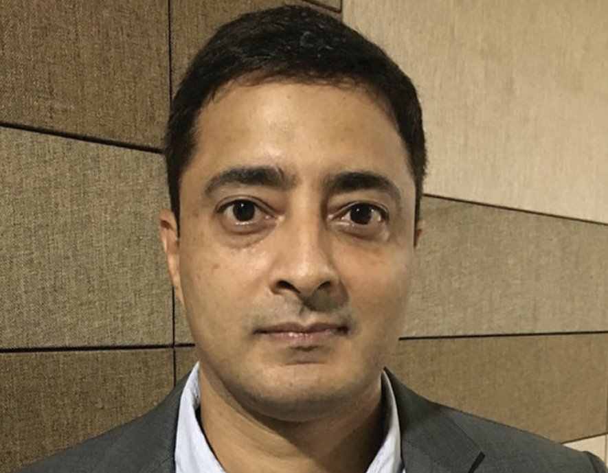 Portrait of Sachin Dingankar, faculty at First Bridge Business School
